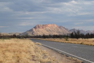 Storm clouds gather over the West MacDonnell Ranges via Alice Springs, Northern Territory
