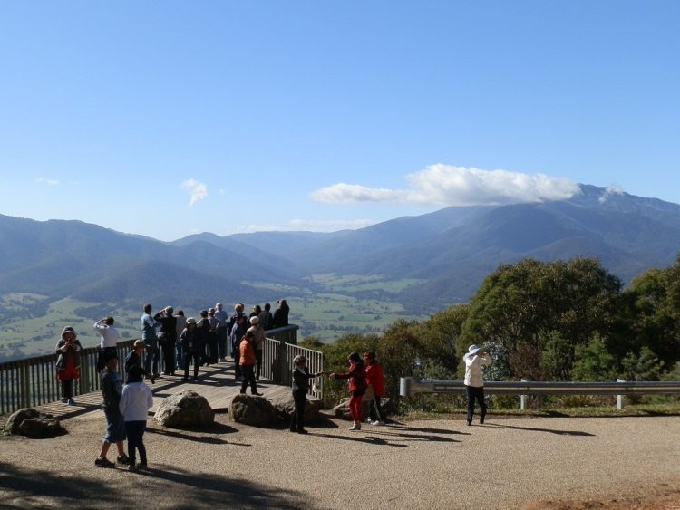 Tourists admiring Mt Bogong, highest mountain in Victoria
