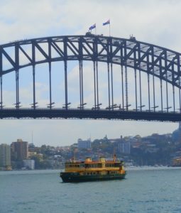 Climbers on Bridge Top with Ferry, Sydney