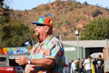 Yes, that's a Cane Toad in his mouth!  Thommo at Kununurra Agricultural Show